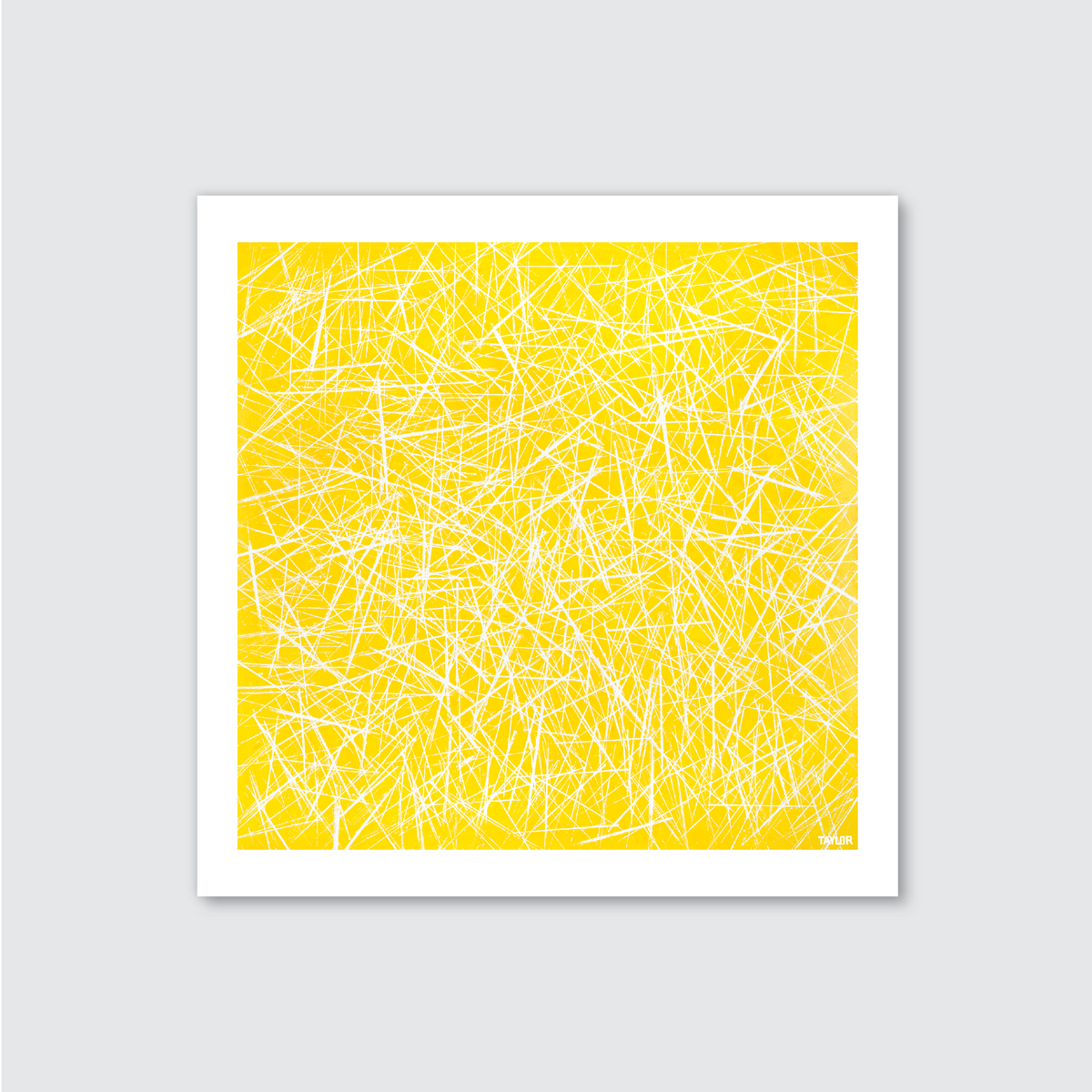 A framed artwork featuring a yellow background with white, spaghetti-like zigzag lines.