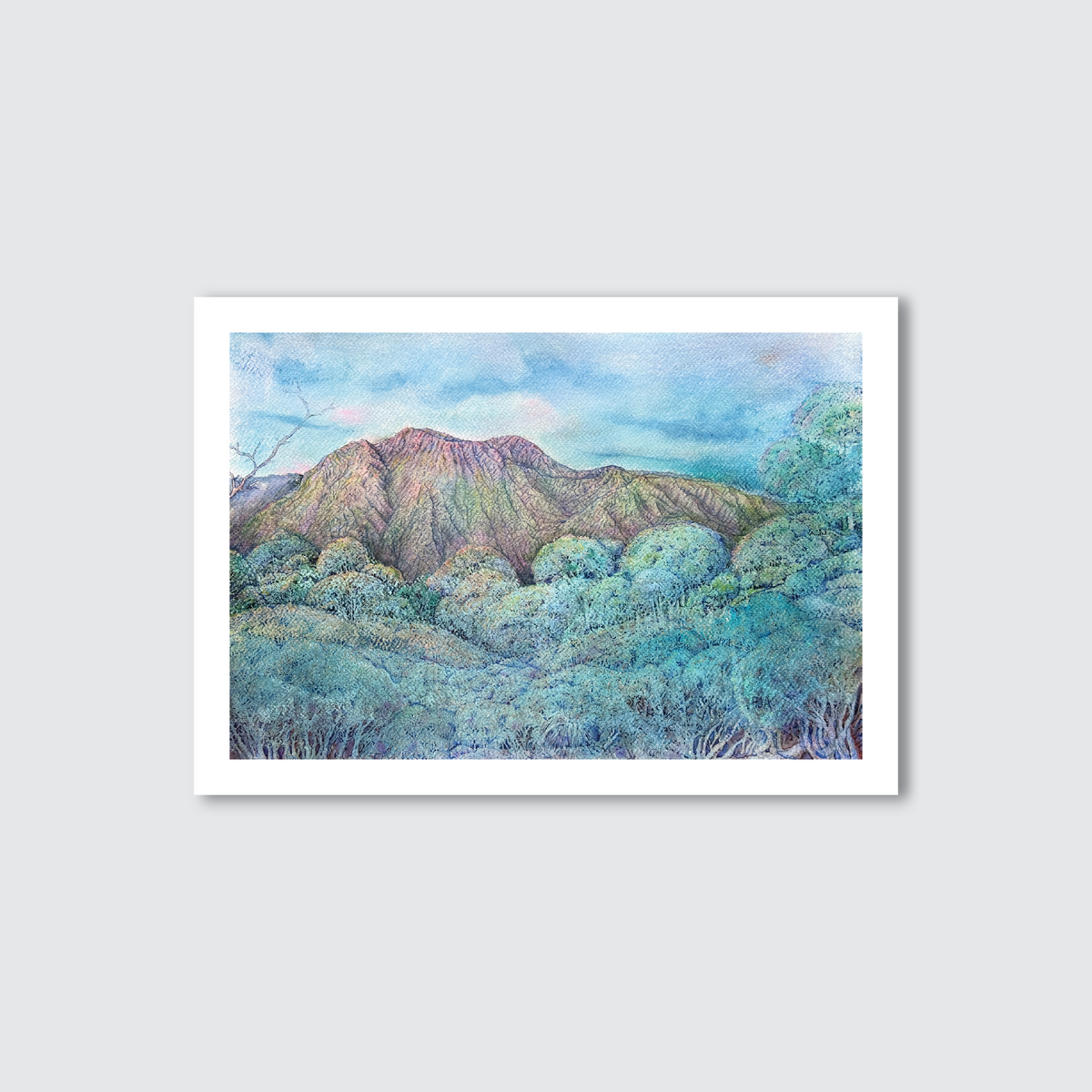 Mountain landscape with trees on a light blue background and trees in the foreground.