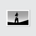 A black and white image of a digital fashion model striking a pose against a minimalist background, representing the Index_M1 art print.
