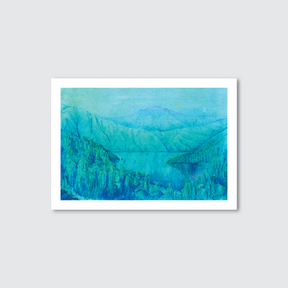 Framed artwork of a blue mountain Lake Haze in New Zealand landscape on a light gray background