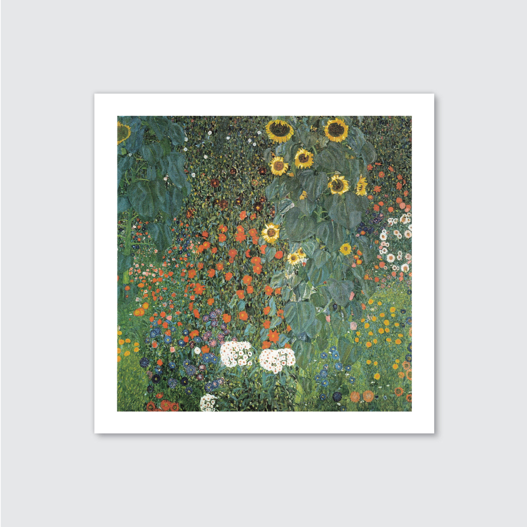 Framed artwork of a colorful floral garden on a light gray background