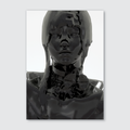 A black and white image of a sculpture with a female head and abstract, geometric patterns in the background.