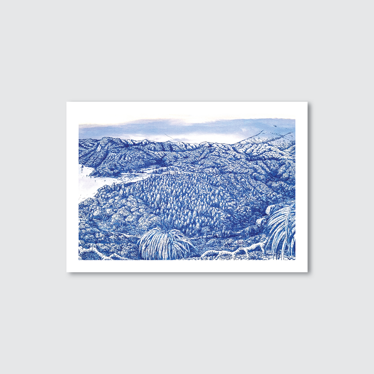 Blue and white landscape print of a mountainous area with trees and waterfalls on a light gray background.