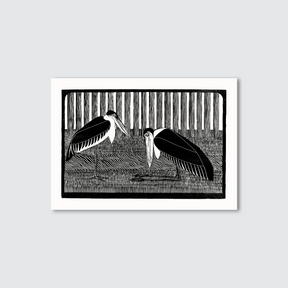 Framed artwork of two black and white birds on a gray background